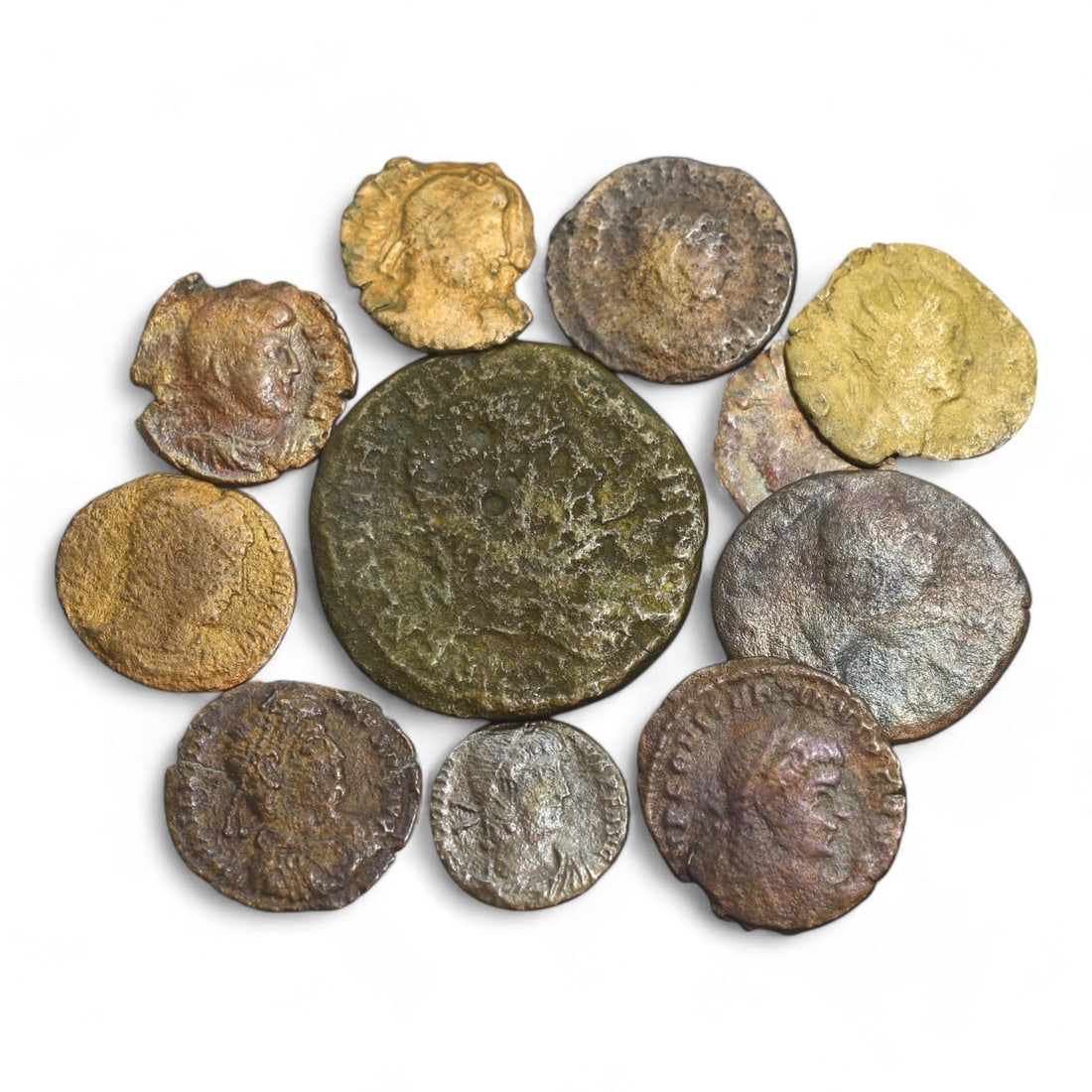ANCIENT ROMAN EMPIRE: Bronze Coin Lot, Circa 1st-4th Century CE (32g, 15-30mm, 11 Pieces): This collection of ancient Roman coins, offers a glimpse into the economic and cultural fabric of the Roman Empire. The coins feature a variety of designs, including imperial portraits, deities, and m
