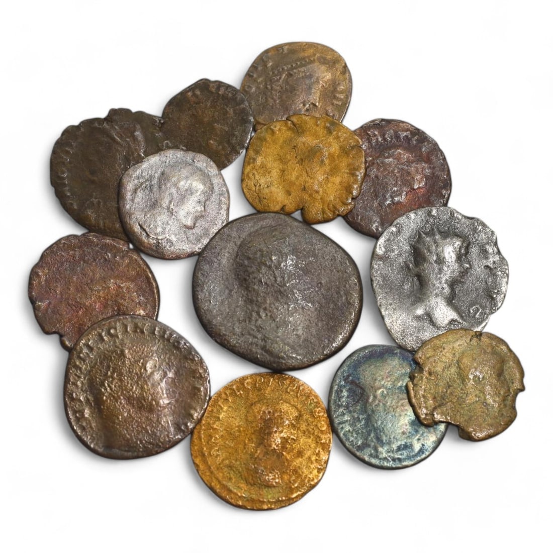 ANCIENT ROMAN EMPIRE: Bronze Coin Lot, Circa 1st-4th Century CE (29g, 13-25mm, 13 Pieces): This collection of ancient Roman coins, offers a glimpse into the economic and cultural fabric of the Roman Empire. The coins feature a variety of designs, including imperial portraits, deities, and m