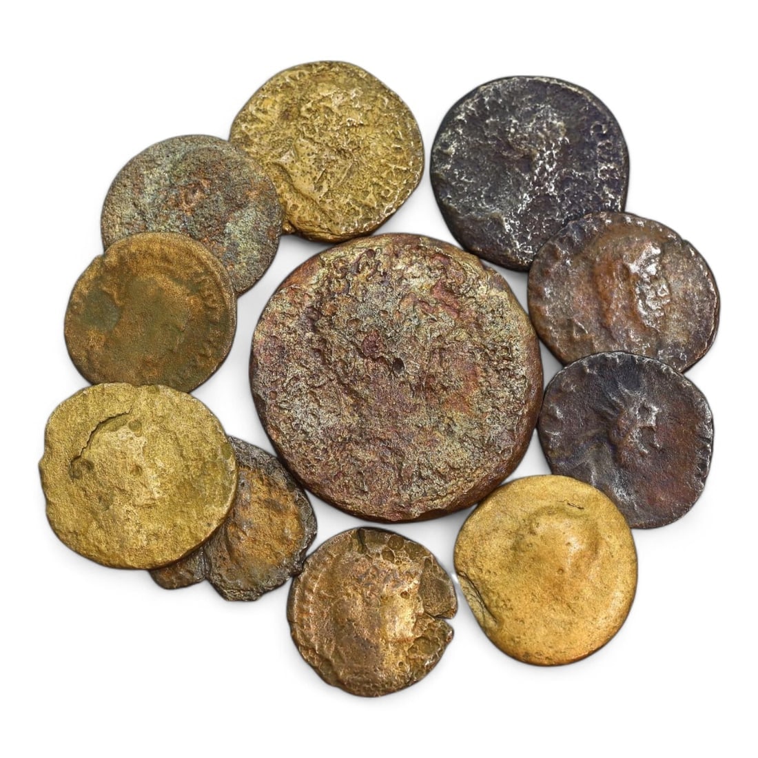 ANCIENT ROMAN EMPIRE: Bronze Coin Lot, Circa 1st-4th Century CE (43g, 17-30mm, 11 Pieces): This collection of ancient Roman coins, offers a glimpse into the economic and cultural fabric of the Roman Empire. The coins feature a variety of designs, including imperial portraits, deities, and m