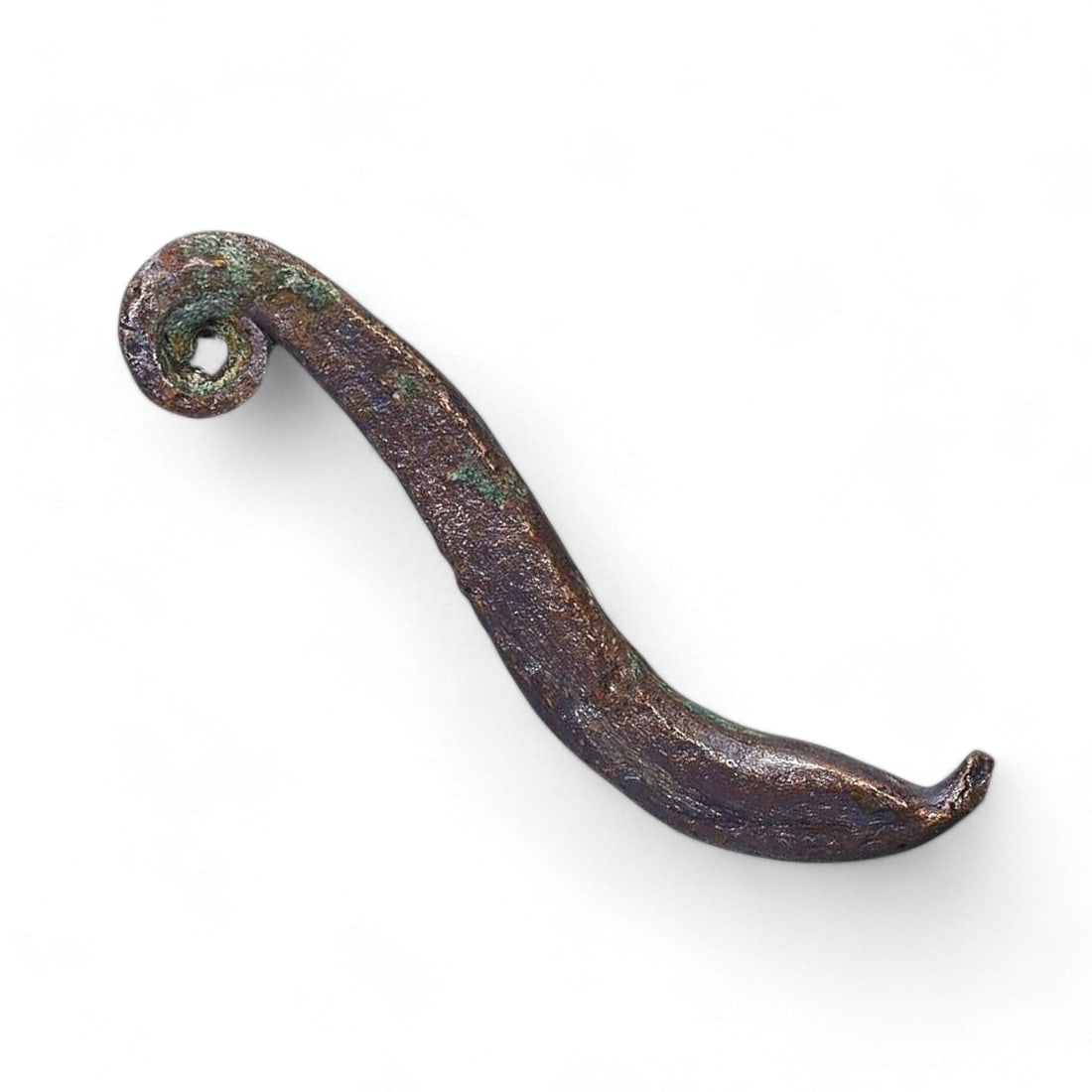 CELTIC PROTO-MONEY: Bronze, 23g, 6cm: This intriguing piece of Celtic proto-money, weighing 23 grams and measuring 6 cm, reflects the diverse and localized systems of exchange used by ancient Celtic tribes. The curved, ornate shape may ha