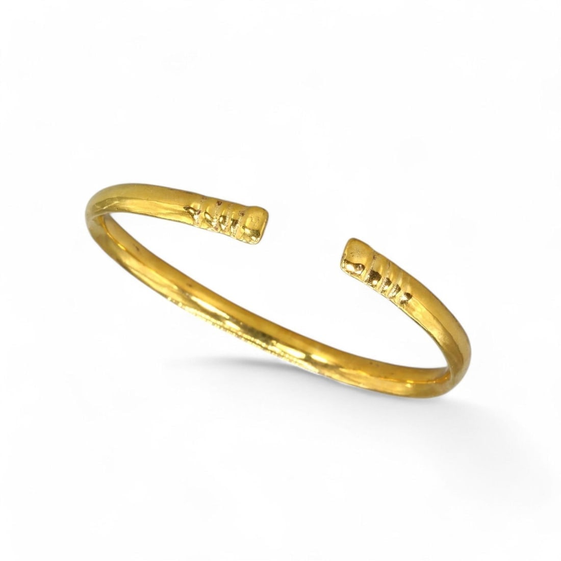 VIKING AGE: Gold-Gilt Armlet Bracelet, 9g, 5cm, 24k Gold Gilt: This exquisite Viking armlet bracelet, weighing 9g and measuring 5cm in diameter, is crafted with a 24k gold gilt finish, reflecting the opulence and craftsmanship of the Viking Age. The open design f