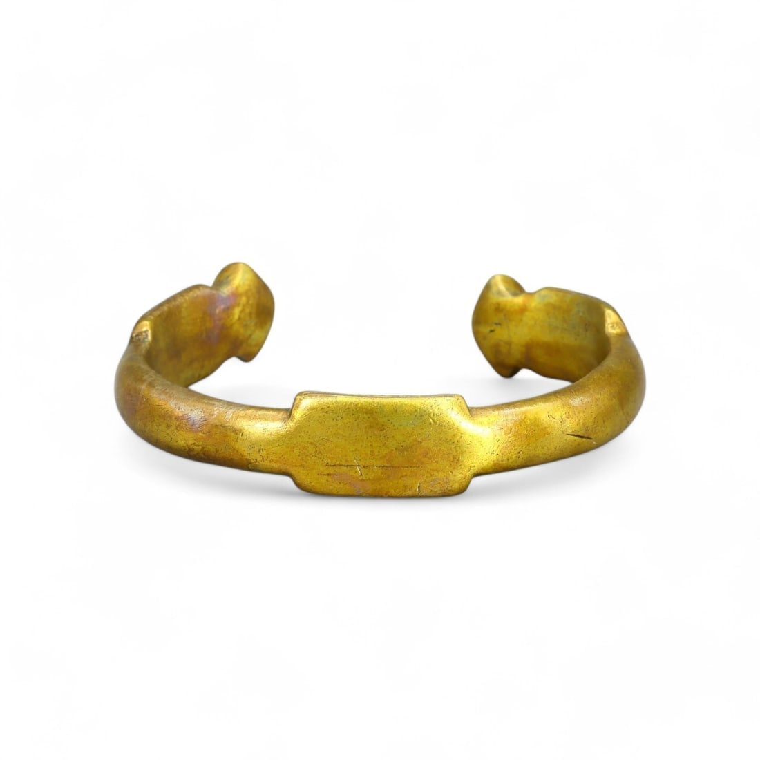 ANTIQUE AFRICAN: Gold-Gilt Bronze Currency Bracelet, 19th-Early 20th Century (99g,1x7cm): This impressive African gold-gilt bronze bracelet, weighing 99g and measuring 7cm in diameter, is a stunning example of traditional African currency. Its bold, rounded form and polished finish reflect