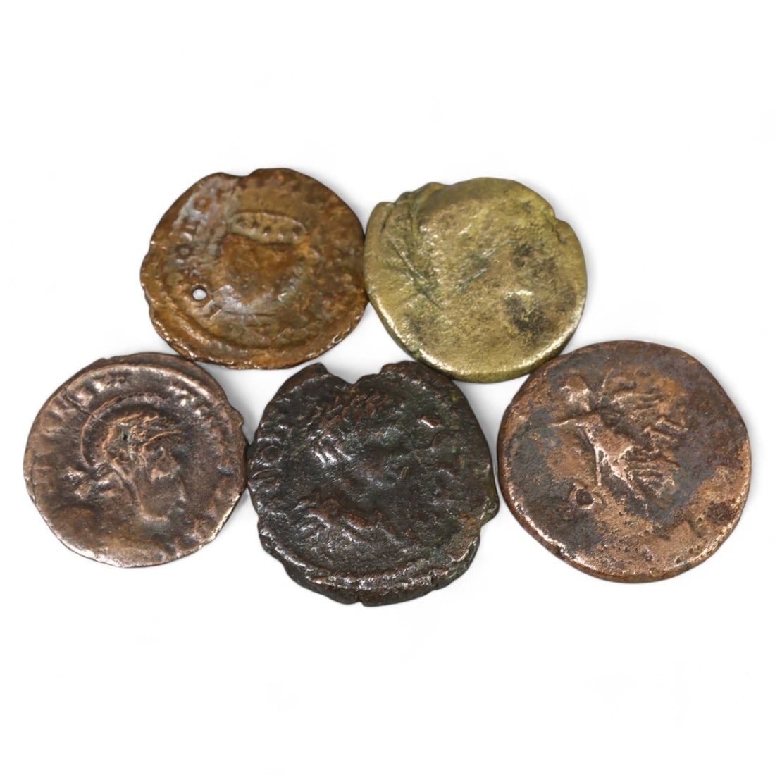 ROMAN IMPERIAL AND PROVINCIAL: Lot of 5 Bronze Coins, 1st-3rd Century CE (17g, AE17-20mm): This intriguing lot comprises five Roman bronze coins, showcasing a mix of imperial and provincial mintings. Each coin features distinctive iconography representative of Roman political authority and 