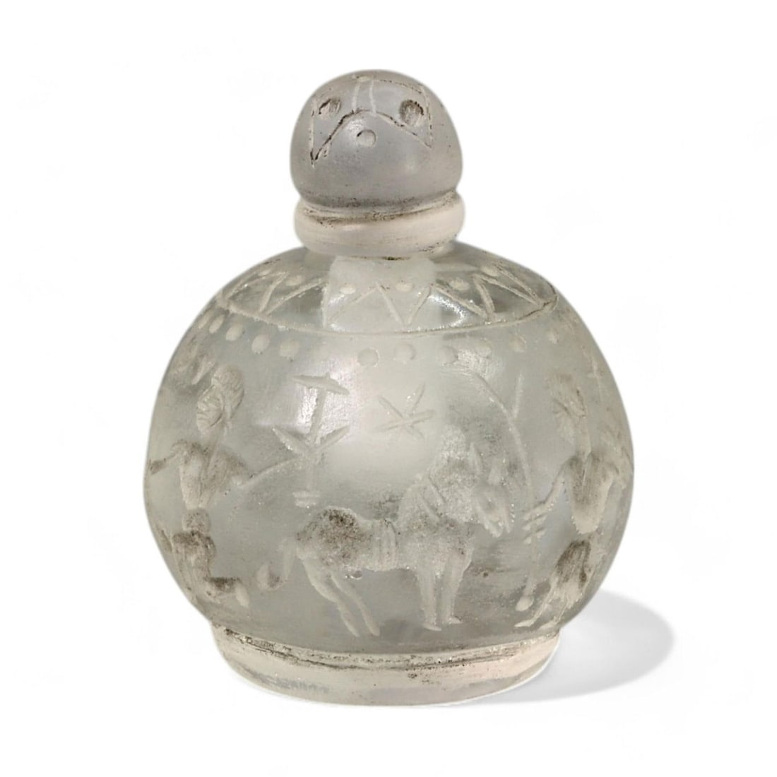 ANCIENT NEAR EASTERN ENGRAVED CRYSTAL FLASK: Circa 1st Millennium BCE (4.9cm x 4cm, 85g): This exquisite ancient Near Eastern crystal flask, crafted with remarkable precision, features detailed engravings depicting human and animal figures, celestial motifs, and geometric patterns. Measuri