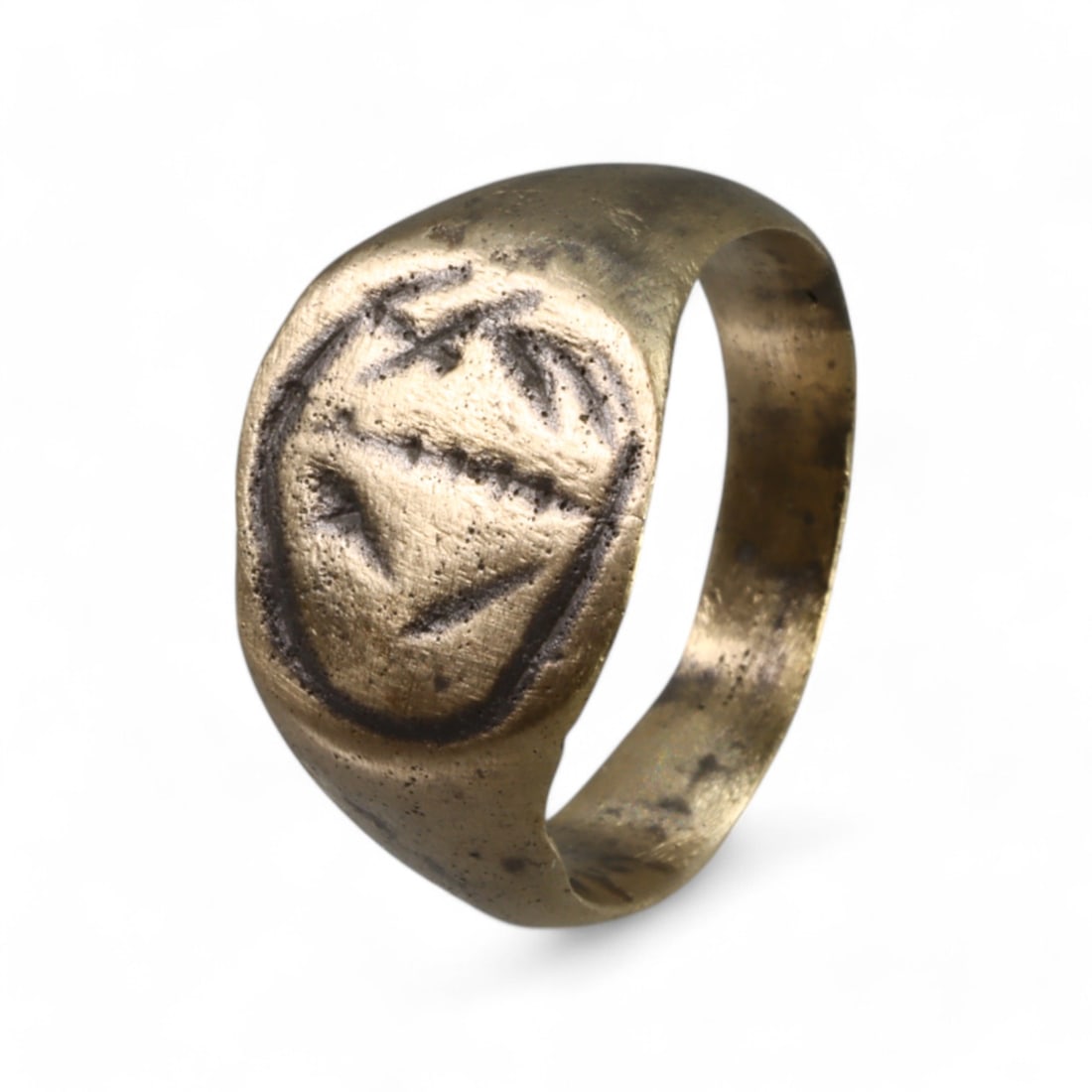 VIKING ERA: Bronze Engraved Signet Ring with Geometric Motif, 9th-11th Century CE (4g, Size 8 US): This Viking-era bronze signet ring features an oval bezel engraved with a bold geometric motif, likely serving as a personal identifier or symbol of allegiance. The smooth band and carefully incised d