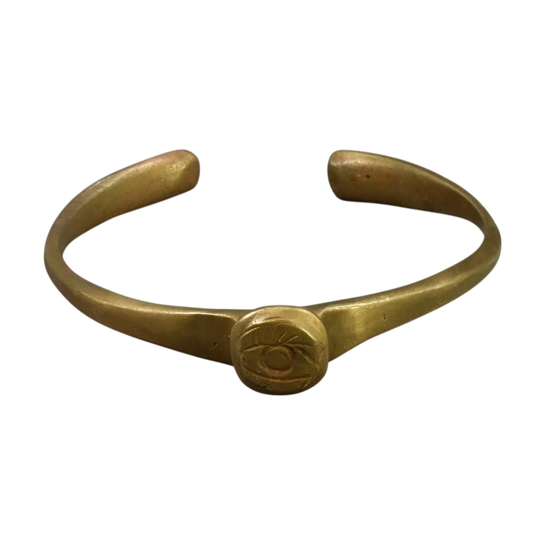 BYZANTINE ERA: Bronze "Eye of Protection" Open Bangle, Circa 6th-9th Century CE (31g, 7cm): This elegant Byzantine-era bronze open bangle features a central medallion engraved with an "Eye of Protection" motif, a design commonly associated with warding off evil and promoting spiritual safegu