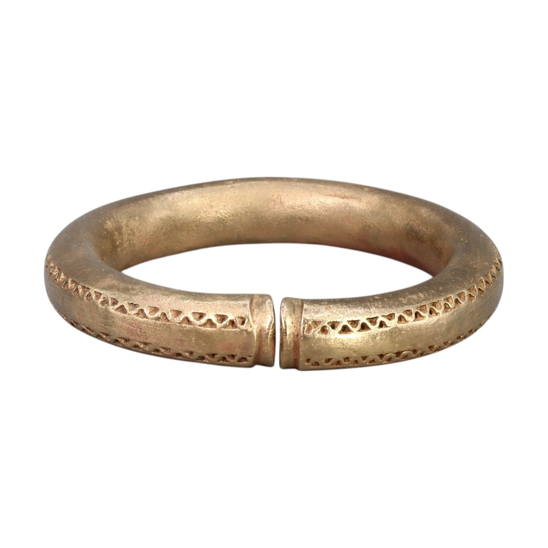 POST-MEDIEVAL ERA: Bronze "Geometric Engraved" Bangle, Circa 17th-19th Century CE (165g, 7x1cm): This impressive Post-Medieval bronze bangle features a sturdy construction with intricate geometric engravings running along its outer edge, reflecting the design aesthetics of the era. The thick and 