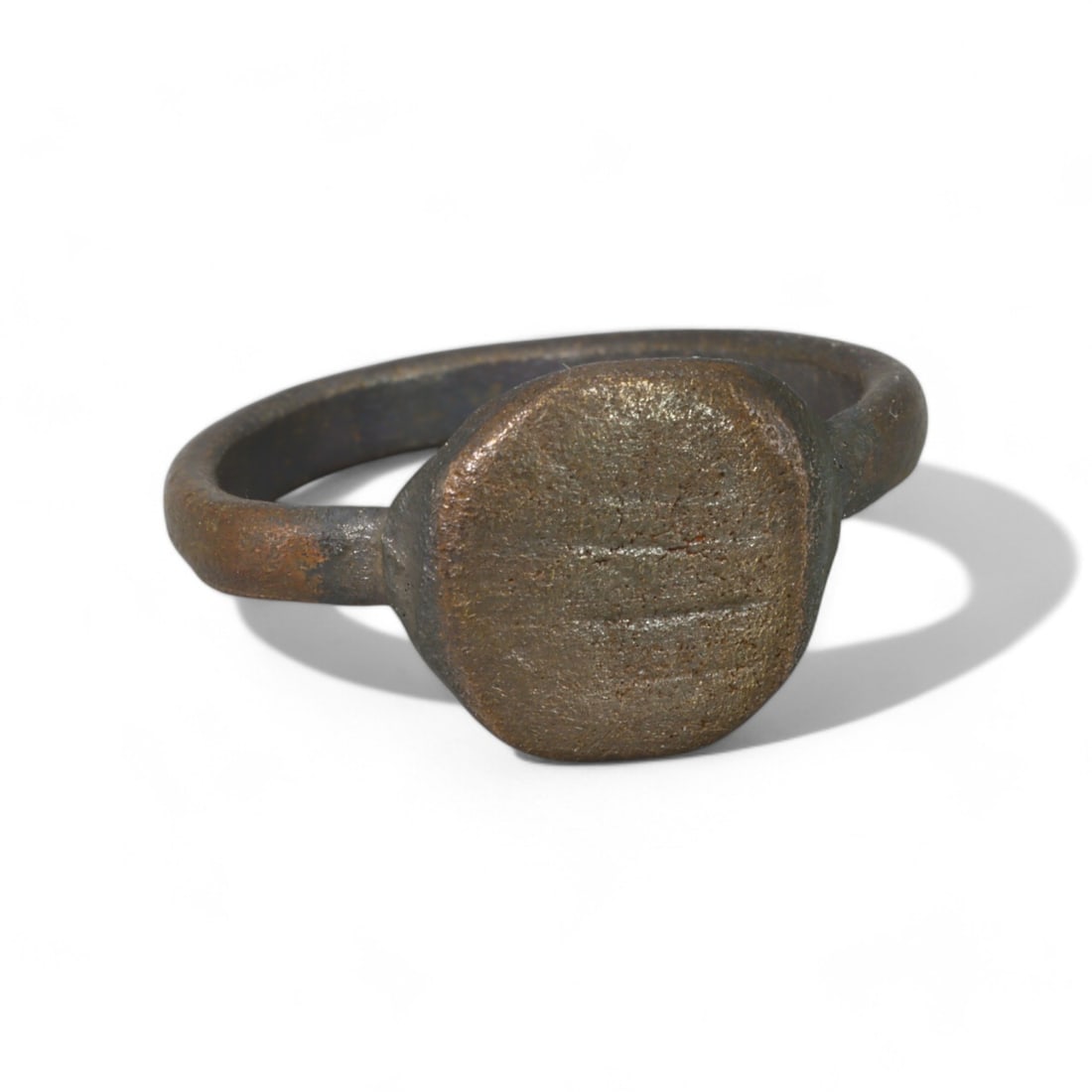CRUSADER ERA: Bronze "Oval Flat Seal" Signet Ring, 12th-14th Century CE (Size 9 US, 5g): This Crusader-era bronze signet ring features an understated oval bezel with a flat surface, which would have likely served as a simple yet effective tool for personal seals. The slightly curved band 