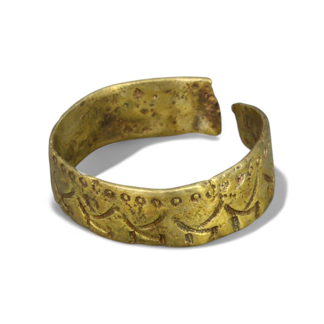 BYZANTINE ERA: Gilded Bronze "Ornamental Wave Motif" Bracelet, 6th-9th Century CE (Size 10 US, 2.7g): This exquisite Byzantine-era gilded bronze bracelet features an intricately engraved wave-like motif encircling the band, symbolizing continuity and the eternal flow of life. The open cuff design refl