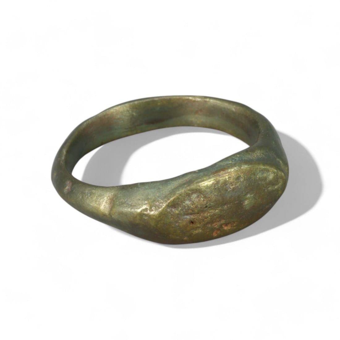 BYZANTINE ERA: Bronze "Minimalist Oval Bezel" Ring, 6th-8th Century CE (Size 4 US, 3g): This understated Byzantine-era ring is crafted in solid bronze, featuring a smooth, minimalist oval bezel that subtly blends into the band. The ring's simple yet elegant design highlights the utilitar