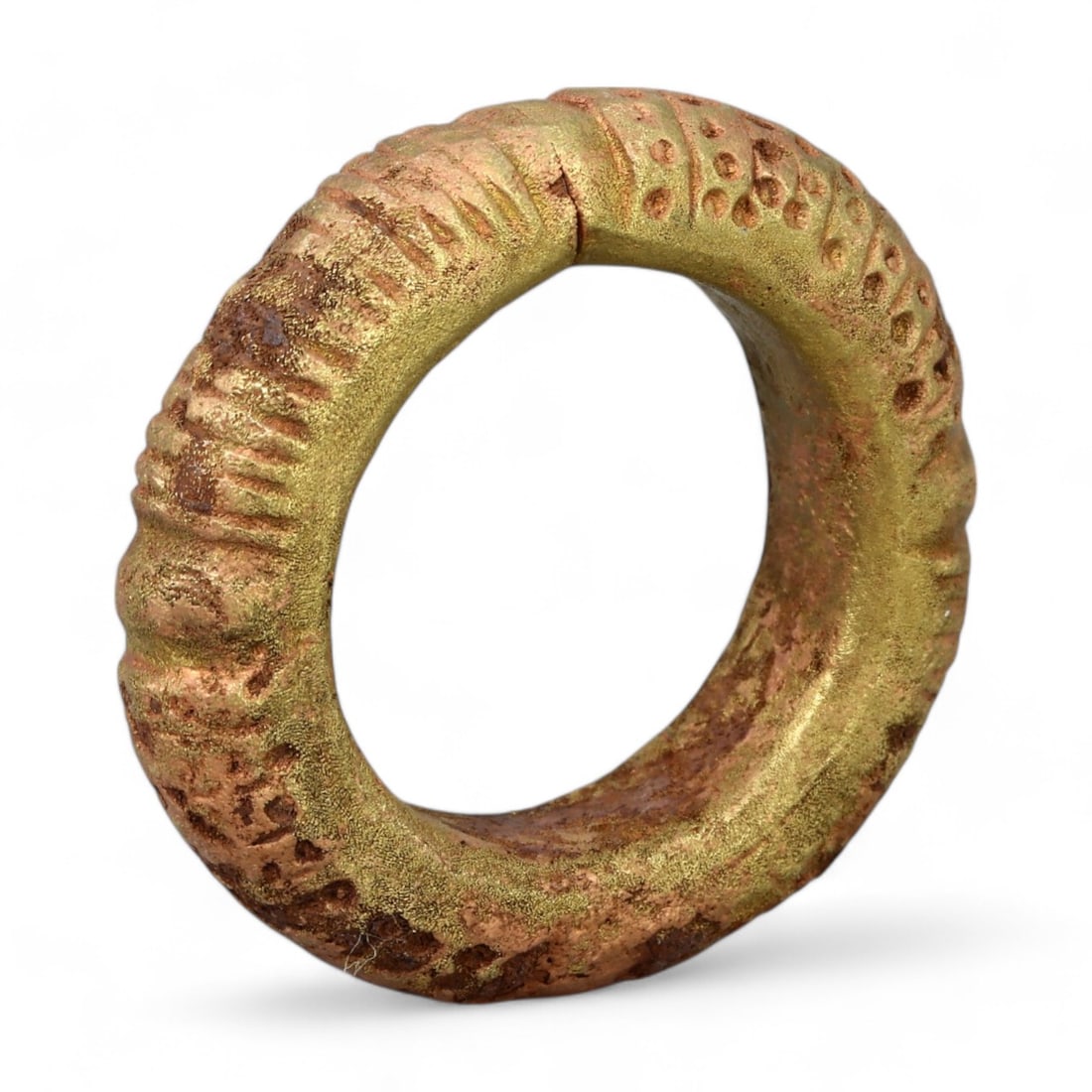 VIKING ERA: Gold-Gilt Proto-Money Ring, Circa 9th-11th Century CE (30g, 4.5cm): This Viking-era proto-money ring features intricate surface detailing and a partial gold-gilt finish, demonstrating its dual role as a form of currency and adornment. Its robust circular form and text