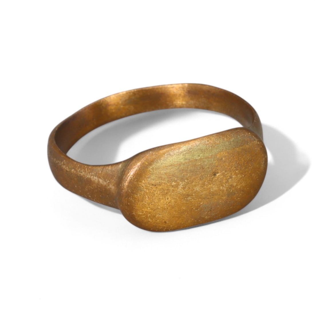 BYZANTINE ERA: Bronze "Plain Oval Signet" Ring, 6th-9th Century CE (Size 8 US, 3g): This elegant Byzantine-era bronze ring features a smooth, unadorned oval bezel, indicative of its intended use as a personal signet or practical adornment. The minimalist design, paired with its sturd