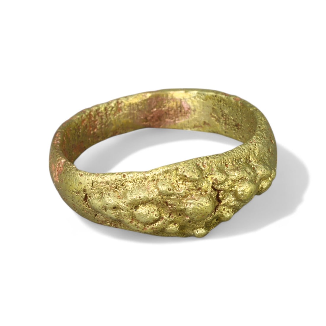 BYZANTINE ERA: Gold Gilt "Textured Band" Ring, 6th-8th Century CE (Size 5 US, 3g): This delicate Byzantine-era gold gilt ring features a textured band adorned with naturalistic, organic motifs that create a unique, almost sculptural appearance. Light yet durable, its intricate detai