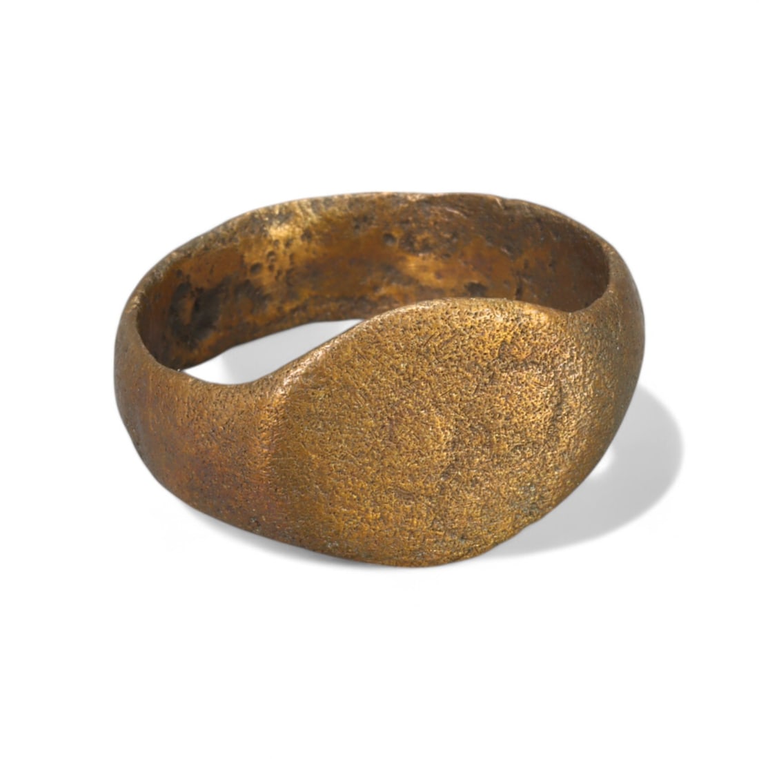 VIKING ERA: Bronze "Domed Signet Bezel" Ring, 9th-11th Century CE (Size 8 US, 3g): This striking Viking-era ring, crafted from solid bronze, features a broad domed bezel with a smooth yet textured surface. Likely intended as a signet or personal adornment, its robust design showcase