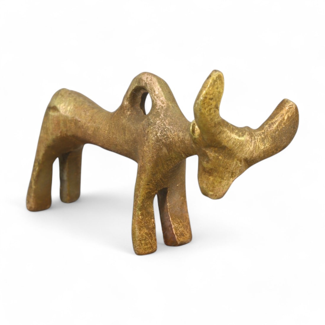 MONGOLIAN: Gold-Gilt Bovine Amulet Pendant, 18th-19th Century CE (19g, 4x3cm): This striking Mongolian gold-gilt pendant depicts a stylized bovine figure, symbolizing strength and prosperity. Measuring 4x3 cm and weighing 19g, its bold yet minimalist design reflects the cultural