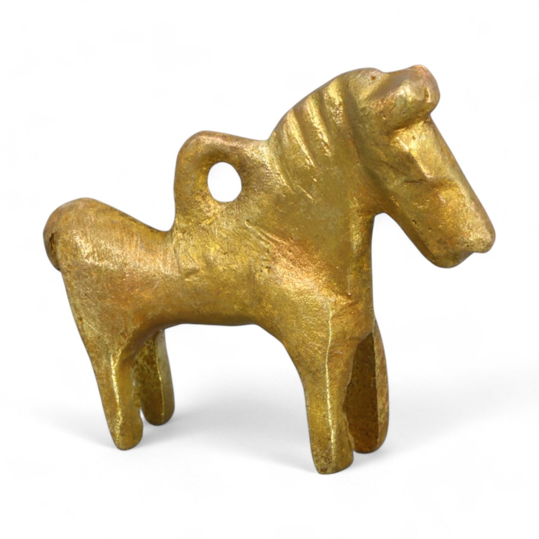 MONGOLIAN: Gold-Gilt Pony Amulet Pendant, 18th-19th Century CE (11g, 3x2.4cm): This finely crafted Mongolian gold-gilt amulet pendant depicts a stylized pony, a revered symbol in Mongolian culture. Measuring 3x2.4 cm and weighing 11g, the pendant combines simplicity with symboli