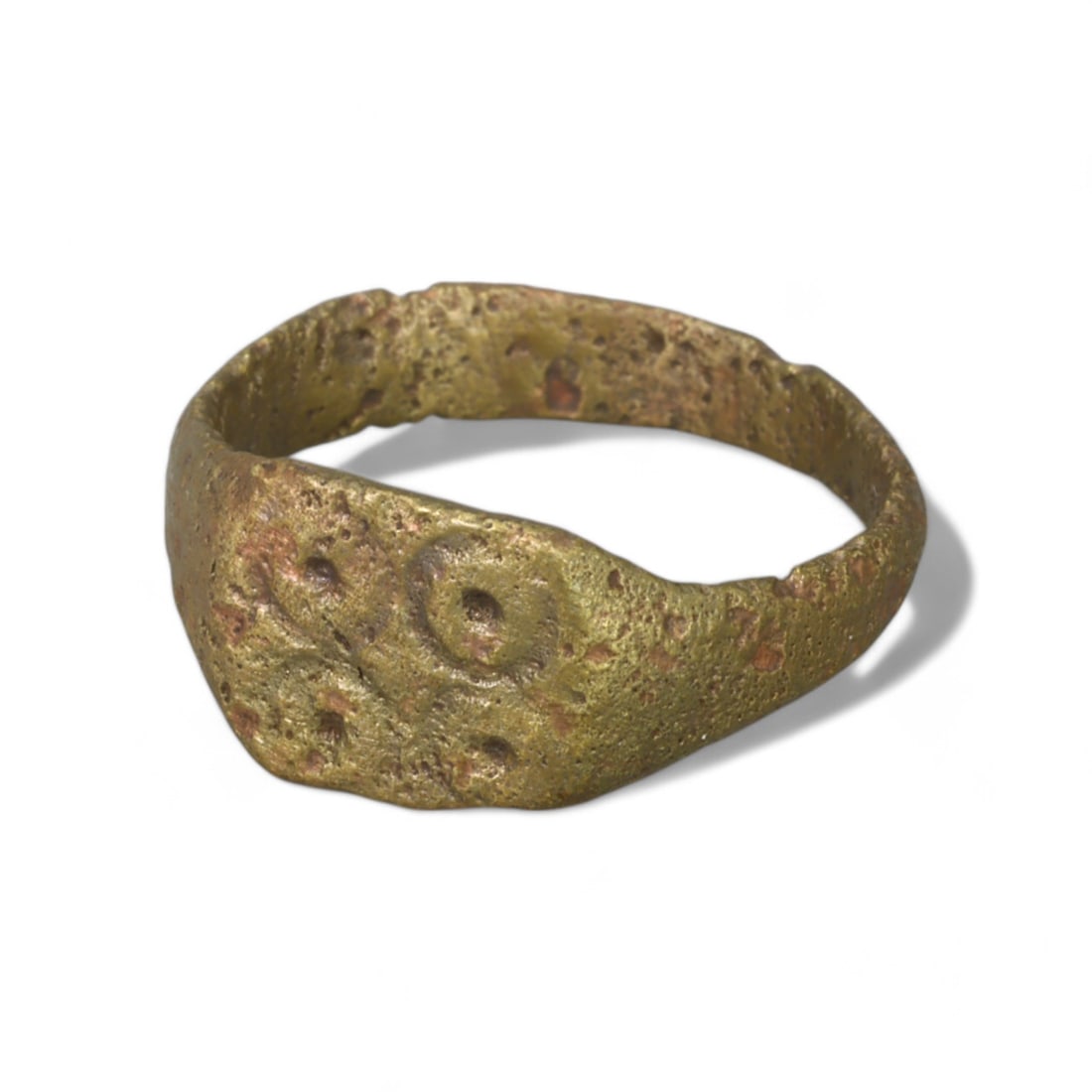 CRUSADER ERA: Bronze "Triadic Motif" Ring, 12th-14th Century CE (Size 7 US, 3g): This captivating Crusader-era bronze ring showcases a distinctive triadic circular motif engraved on the bezel, evoking themes of unity and divine symbolism prevalent during the medieval period. The b