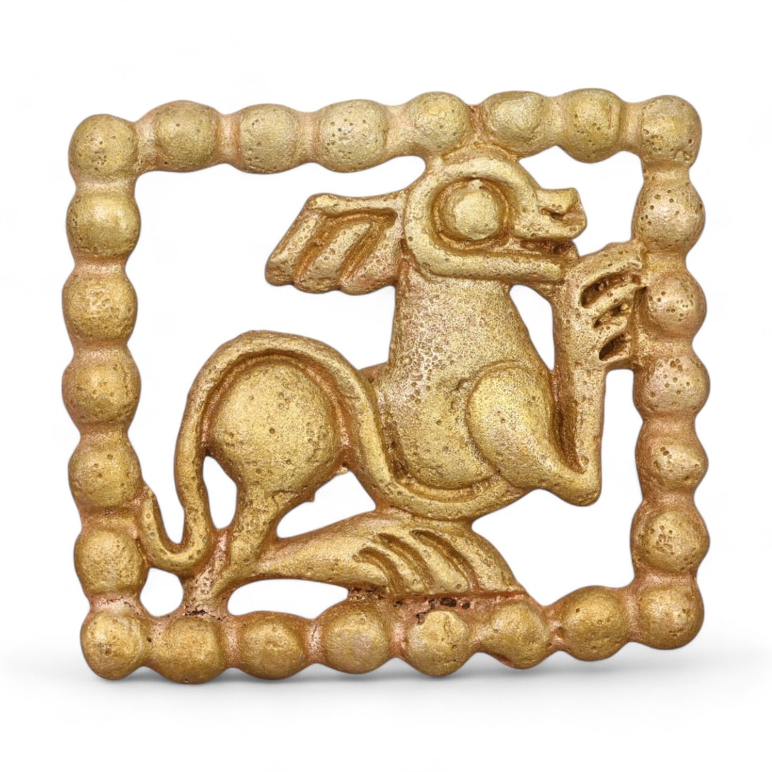 SIBERIAN: Gold-Gilt Belt Buckle with Mythical Beast Motif, 18th-19th Century CE (48g, 5.5x5cm): This extraordinary Siberian gold-gilt belt buckle showcases a finely detailed mythical beast enclosed within a beaded rectangular frame. Weighing 48g and measuring 5.5x5 cm, the buckle exemplifies the