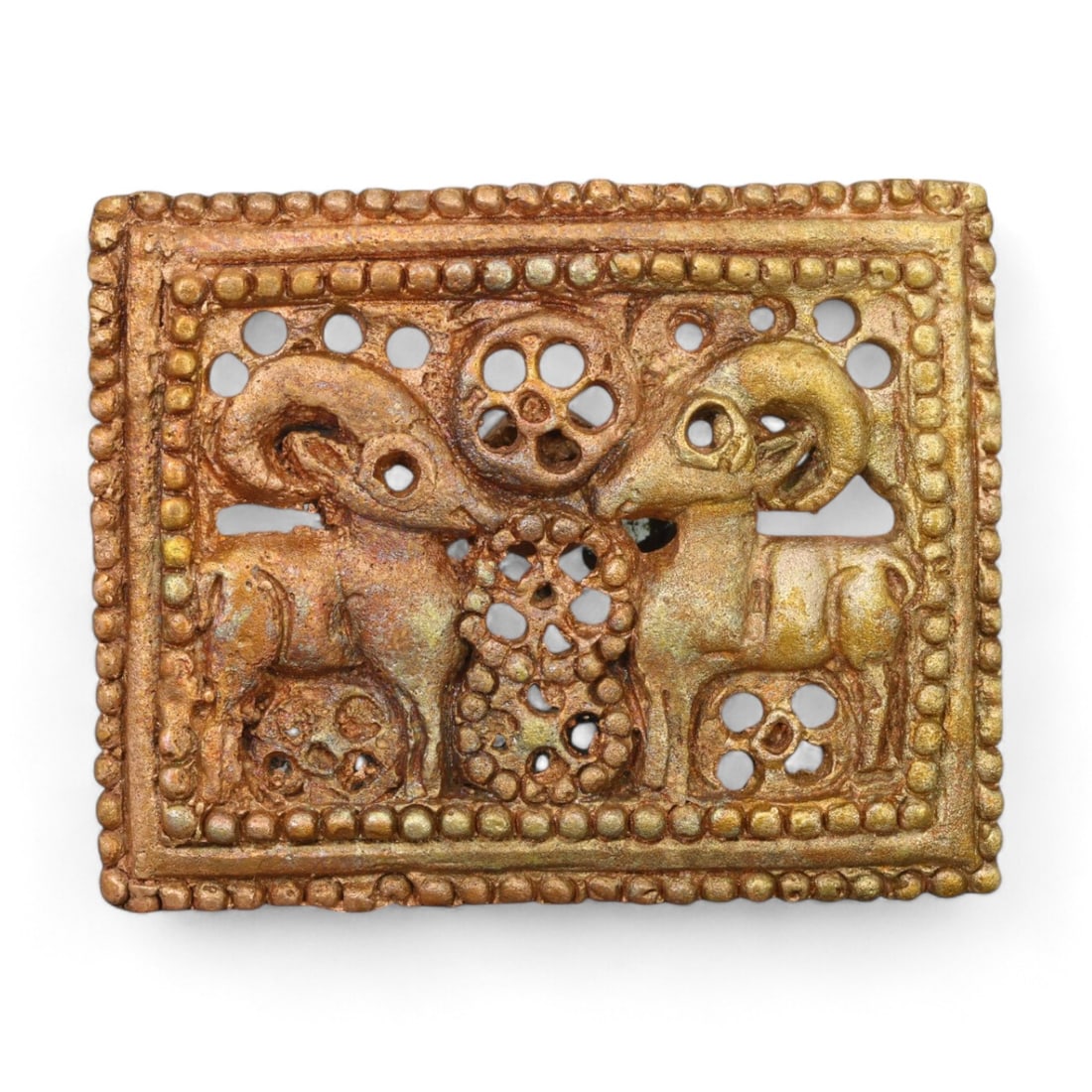 SIBERIAN: Gold-Gilt Belt Buckle with Ram Motif, 18th-19th Century CE (64g, 6x5cm): This stunning Siberian gold-gilt belt buckle features a meticulously detailed depiction of two rams, framed by a perforated and beaded border. Weighing 64g and measuring 6x5 cm, the buckle reflects th