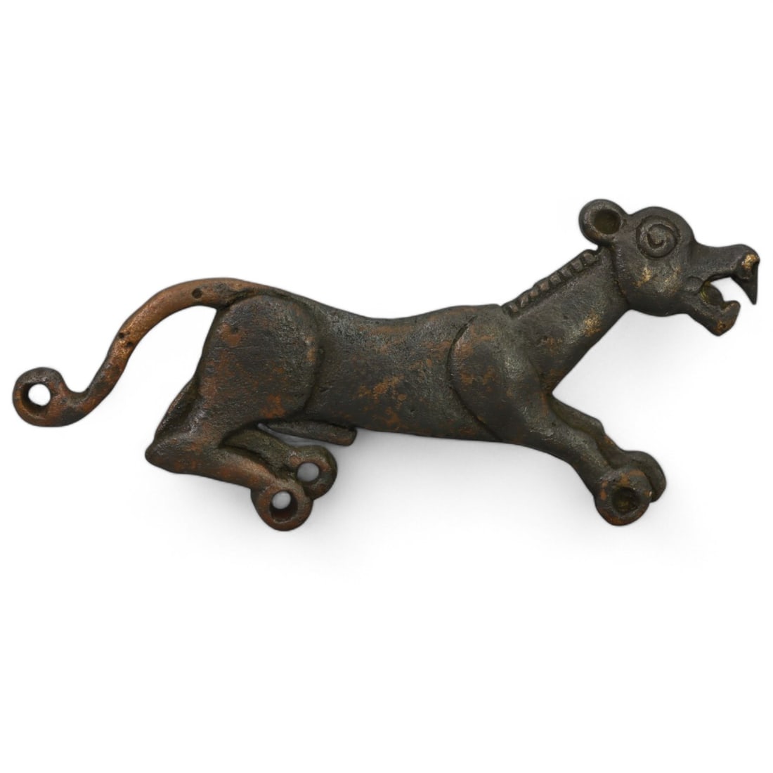SIBERIAN: Bronze Belt Buckle with Feline Motif, 18th-19th Century CE (42g, 10.5x4.5cm): This dramatic Siberian bronze belt buckle features a prowling feline in mid-motion, symbolizing agility, power, and ferocity. Measuring 10.5x4.5 cm and weighing 42g, the piece showcases an elongated a