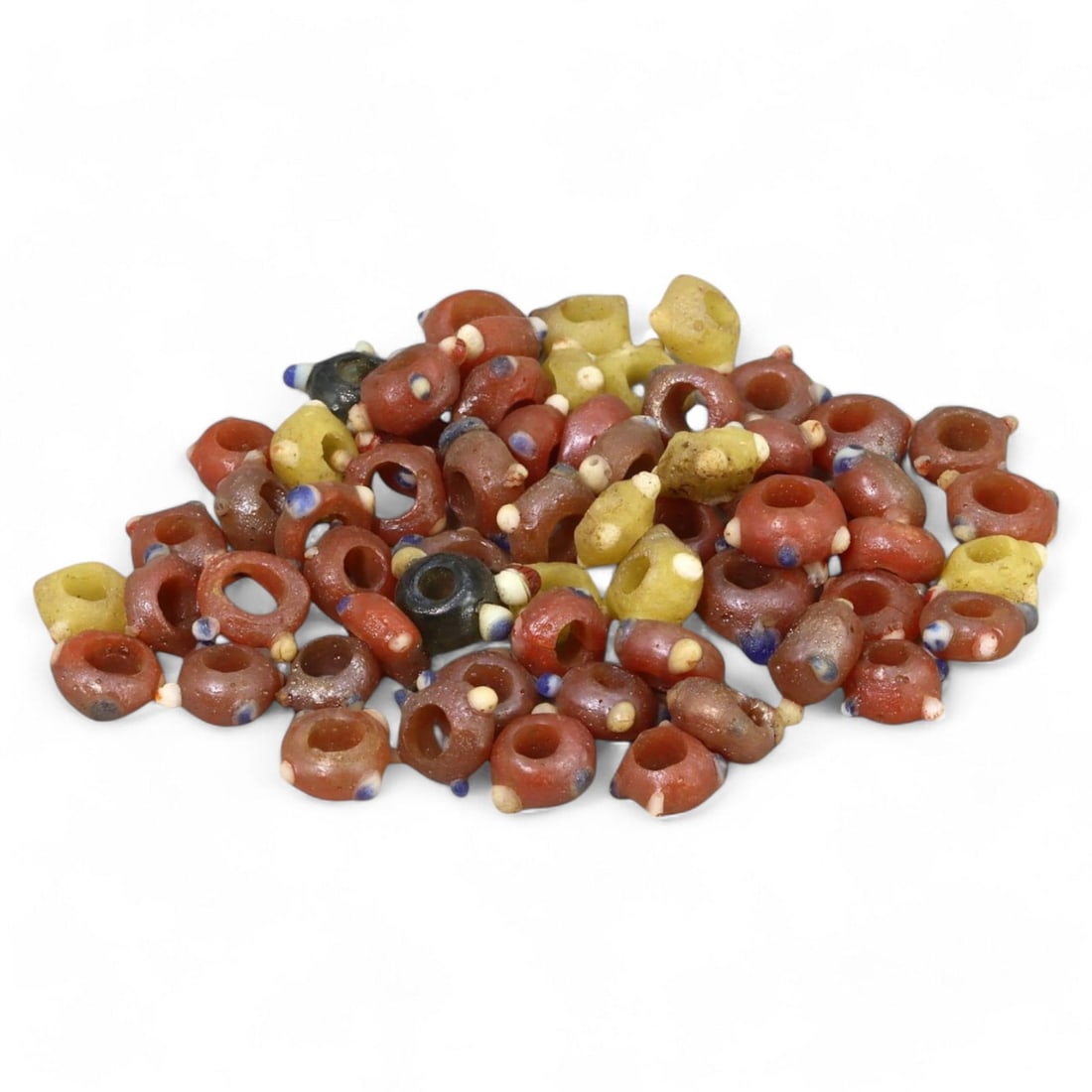 MEDIEVAL MEDITERRANEAN POLYCHROME GLASS BEADS: Circa 9th-15th Century CE (1cm, 16g): This collection consists of intricately crafted polychrome glass beads, each measuring nearly 1cm. Likely originating from the medieval Mediterranean region, the beads display a rich base color adorne