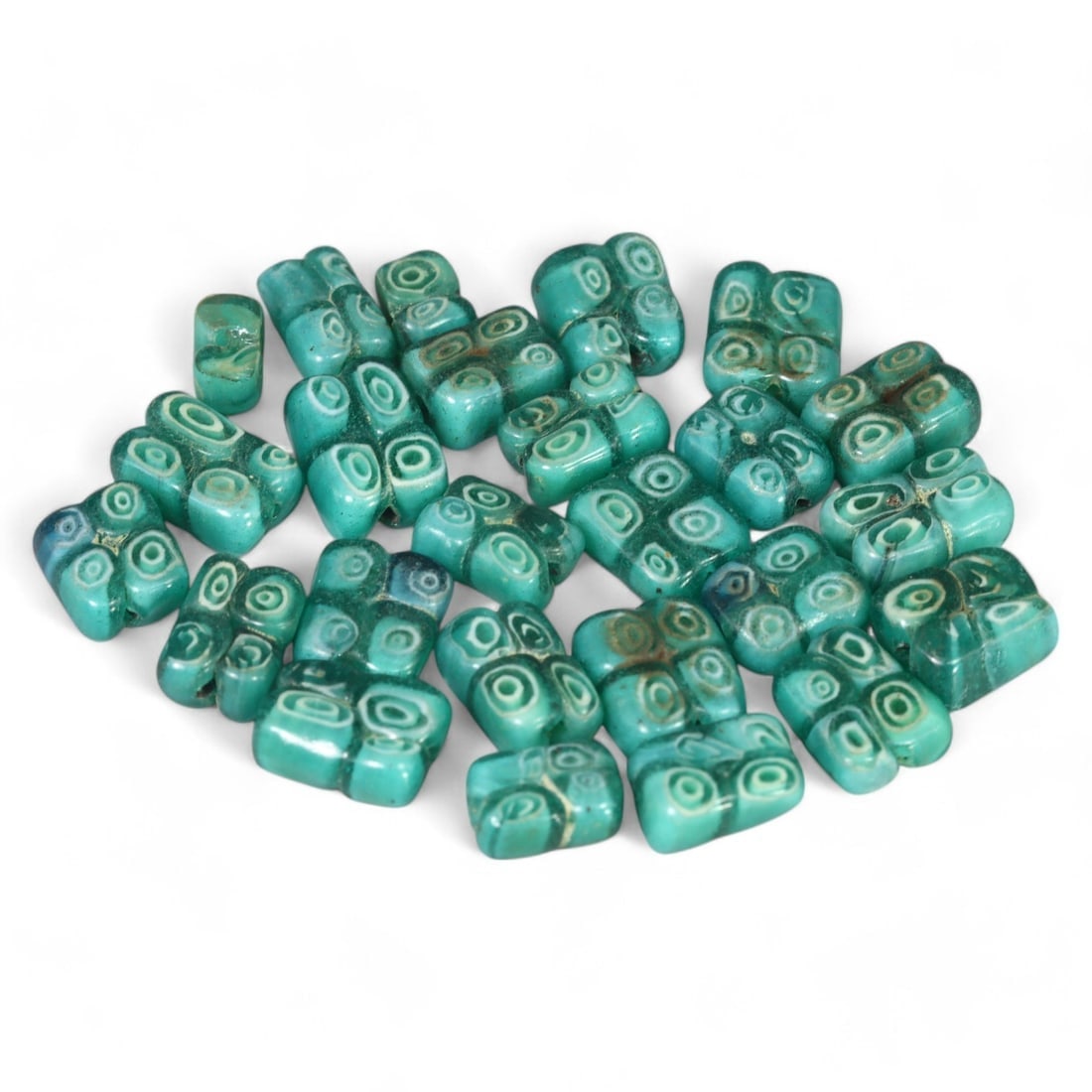 VINTAGE GLASS BEADS: Decorative Glass, Mid-20th Century (23g, 11x6mm): This collection of nine medieval agate beads showcases the intricate banding and natural beauty synonymous with the agate gemstones prized during the height of the Silk Road trade. Crafted in an elong