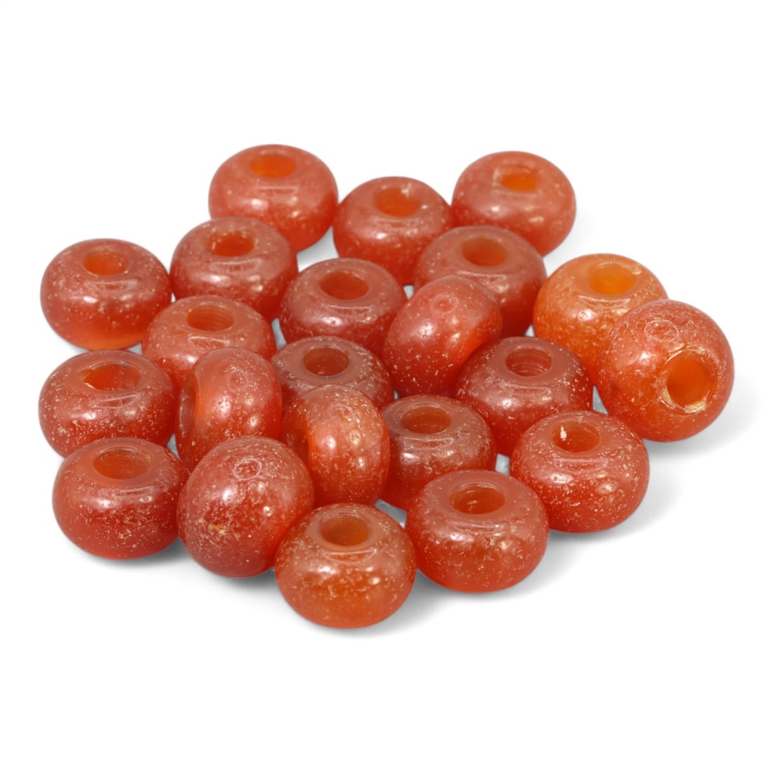 LATE MEDIEVAL: Monochrome Glass Beads, Circa 14th-16th Century (Lot of 22, 42g, 13x8mm): This lot of 22 monochrome glass beads features a luminous orange-red hue, each measuring approximately 13x8mm and weighing a total of 42g. These beads, carefully cleaned to enhance their rich transluc