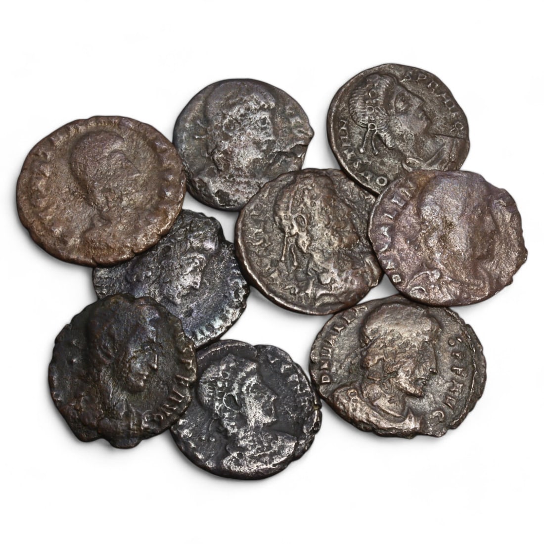 ROMAN EMPIRE: Lot of 9 AE Coins, Late Imperial Period, 13g, 17-18mm: This collection includes nine bronze coins from the late Roman Empire, the obverses feature various portraits of Roman emperors and notable figures, emphasizing the diversity of imperial iconography d