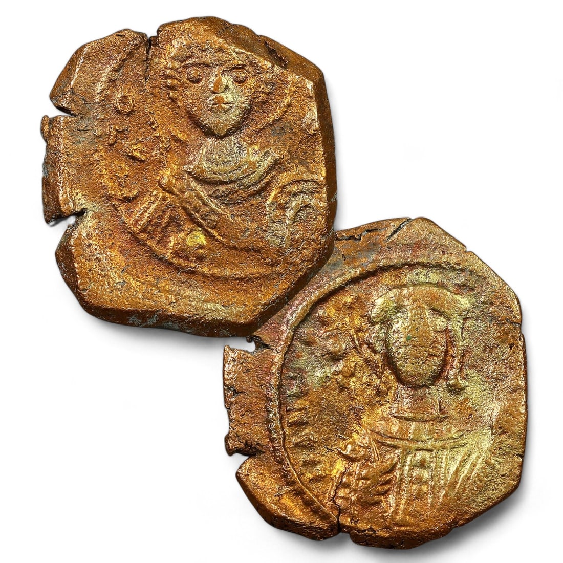 Byzantine Empire: Bronze Half Tetarteron Coin, Manuel I Komnenos, 1143-1180 CE (2g, 16mm): This bronze half tetarteron from the reign of Emperor Manuel I Komnenos features on the obverse a facing bust of Christ Emmanuel, raising His right hand in benediction and holding a scroll in His left