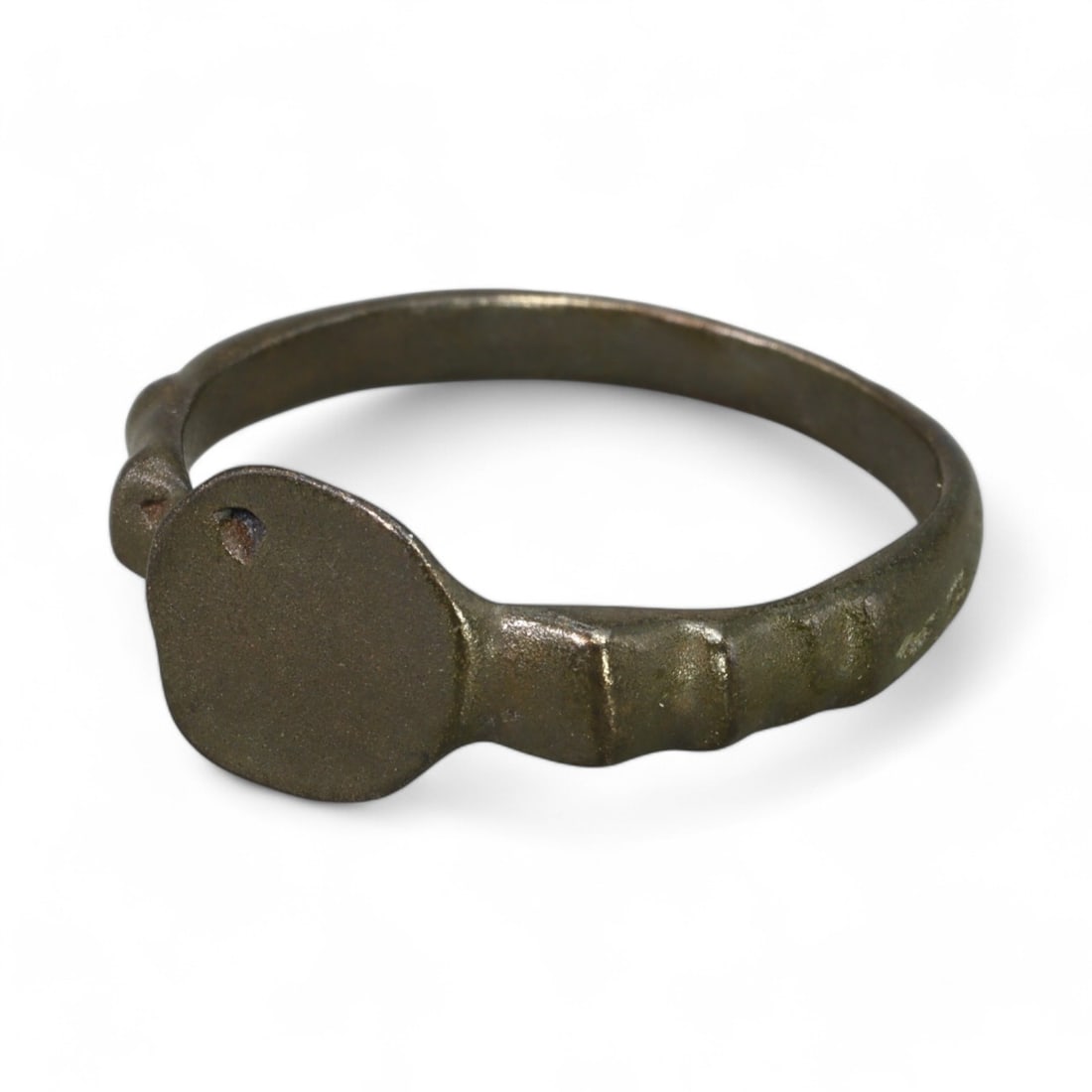 ROMAN ERA: Bronze "Plain Seal" Ring, 1st-3rd Century CE (Size 9 US, 3g): This elegant Roman-era bronze ring features a plain circular bezel, likely used as a seal for personal correspondence or administrative purposes. The minimalist design of the band, with subtle accents