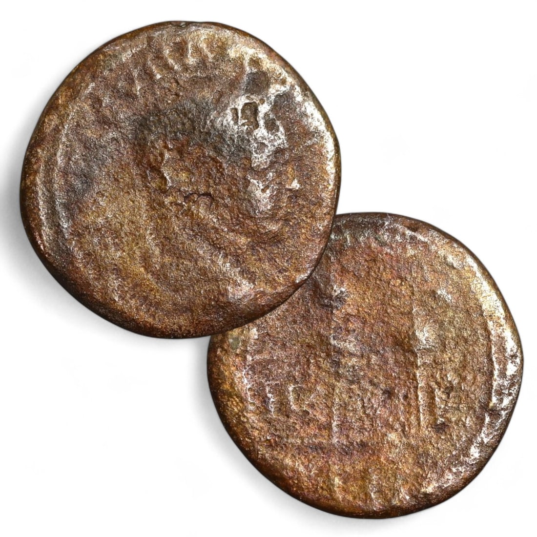 ROMAN PROVINCIAL: AE18 Bronze Coin (3g, 18mm): This Roman Provincial bronze coin features a worn obverse, likely depicting the bust of a Roman emperor or a local authority, symbolizing the extension of Roman power and influence across the province