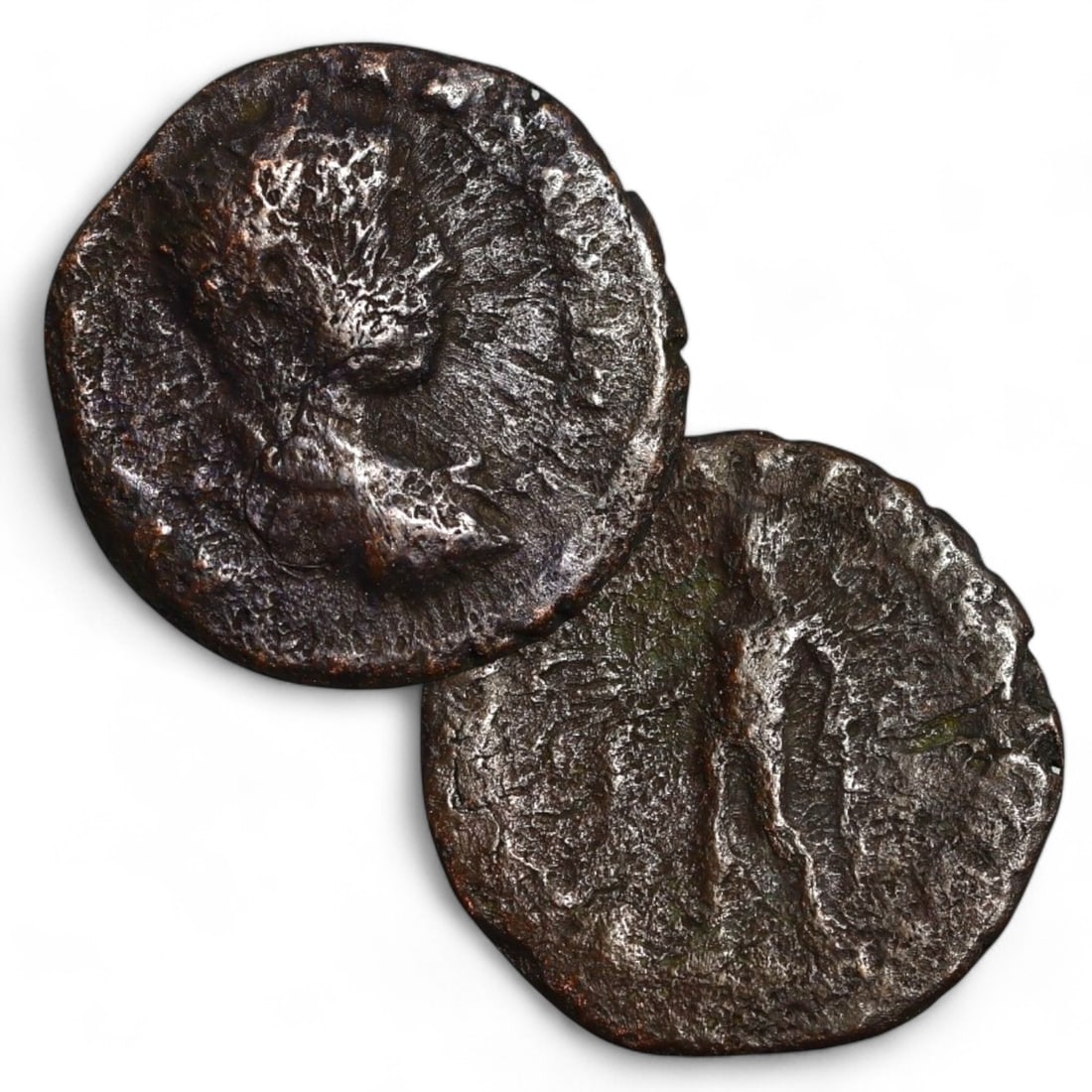 ROMAN PROVINCIAL: AE17 Bronze Coin (2g, 17mm): This small bronze coin features an obverse with a worn but distinguishable profile of an emperor or a local authority, a hallmark of Roman Provincial coinage. The reverse, though heavily worn, appears