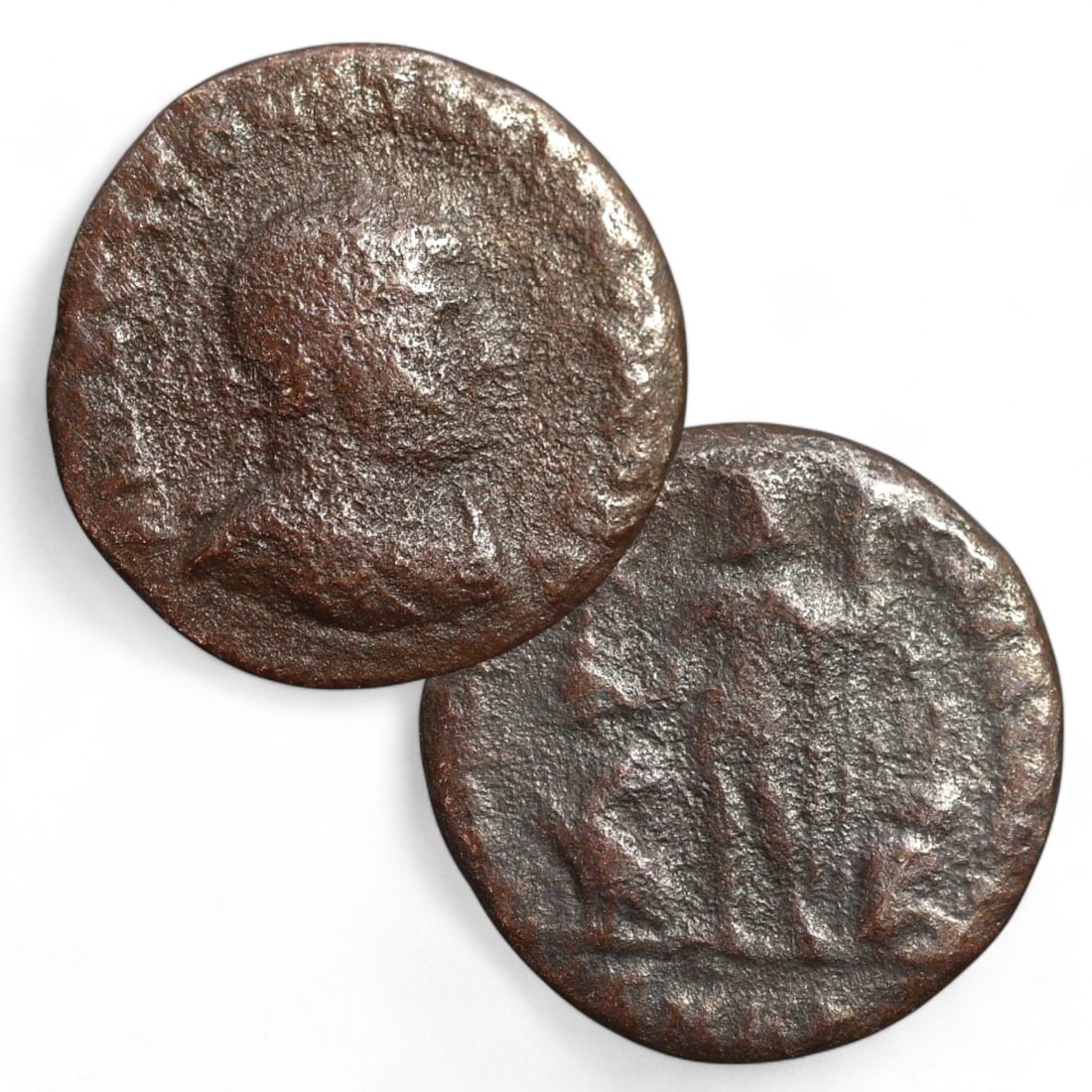 ROMAN PROVINCIAL: AE16 Bronze Coin (2g, 16mm): This small bronze coin features an obverse with a worn bust of an emperor, likely adorned with a laurel wreath, symbolizing imperial authority and divine favor. The reverse depicts a standing figure,