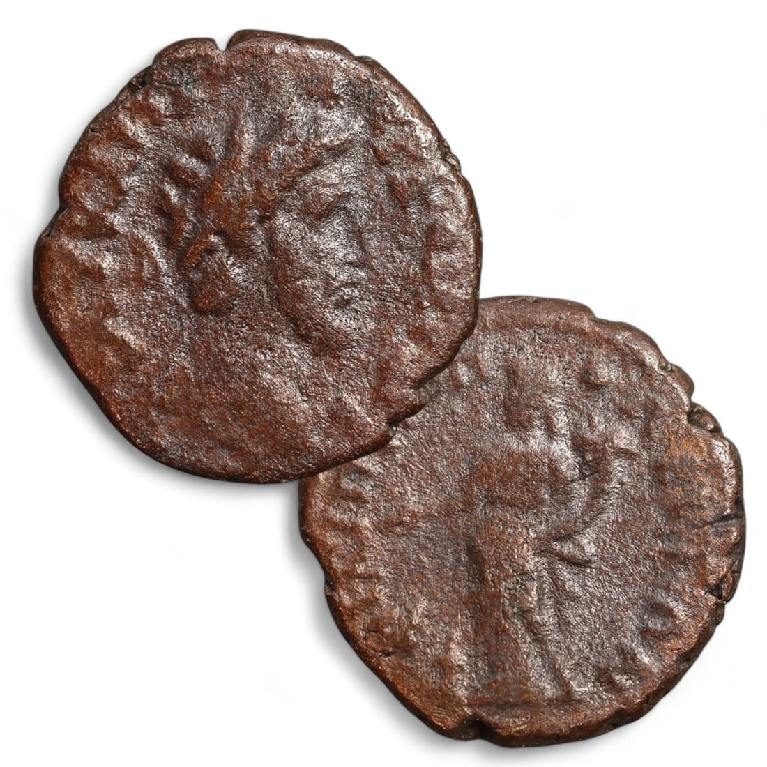ROMAN PROVINCIAL: AE18 Bronze Coin (3.4g, 18mm): This Roman Provincial bronze coin features an obverse with a well-defined bust of an emperor, adorned with a laurel wreath, symbolizing authority and divine favor. The reverse depicts a standing figur