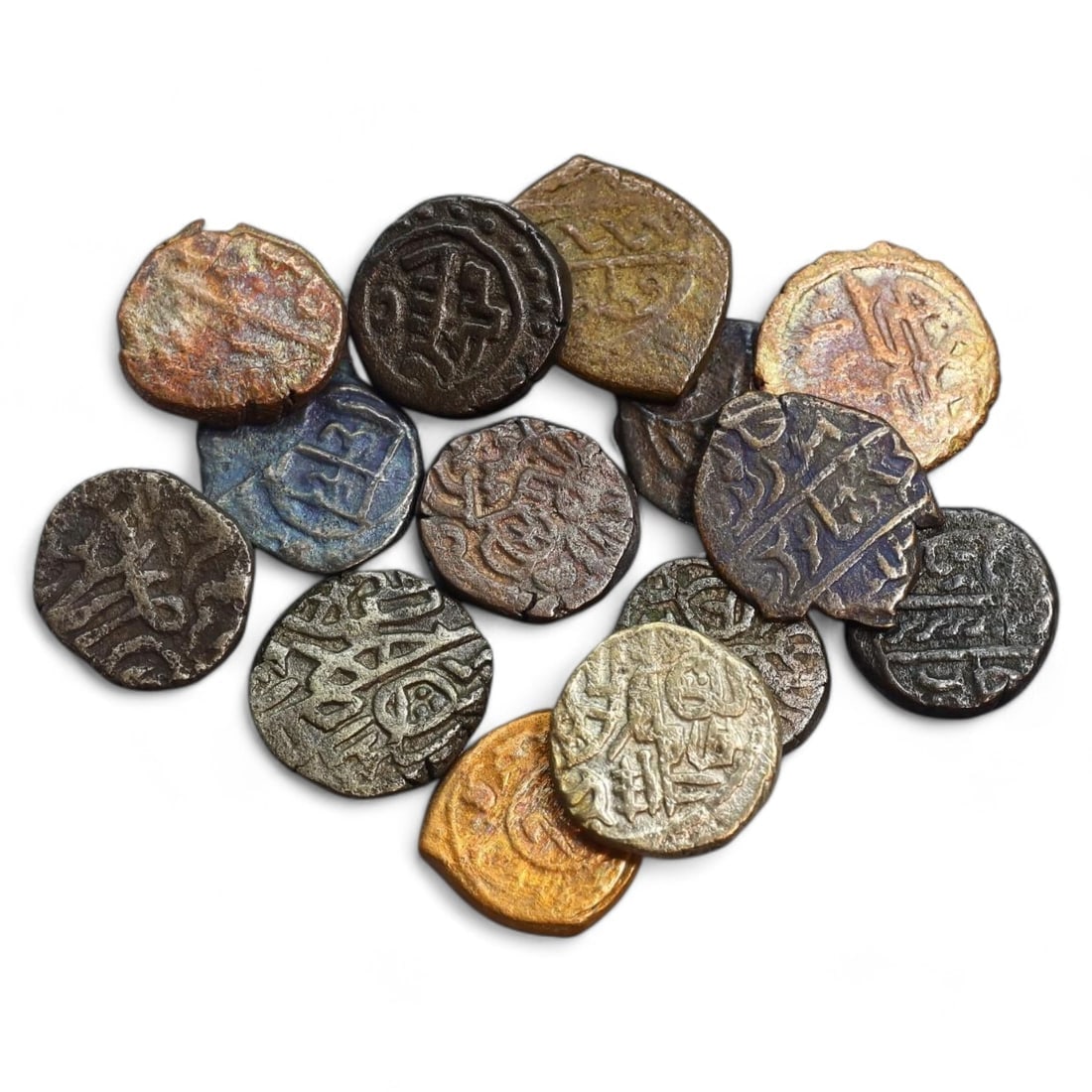 MEDIEVAL INDIA: Lot of 14 Copper Coins, Sultanate Period, 13th-16th Century AD (36g, 13-16mm): This lot consists of 14 copper coins from the medieval Indian Sultanate period, dating to the 13th-16th centuries AD, with diameters ranging from 13mm to 16mm and a total weight of 36g. The coins feat