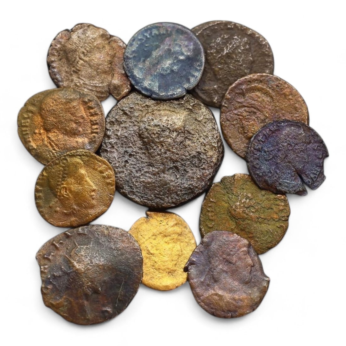 ANCIENT ROMAN EMPIRE: Bronze Coin Lot, Circa 1st-4th Century CE (28g, 16-24mm, 12 Pieces): This collection of ancient Roman coins, offers a glimpse into the economic and cultural fabric of the Roman Empire. The coins feature a variety of designs, including imperial portraits, deities, and m