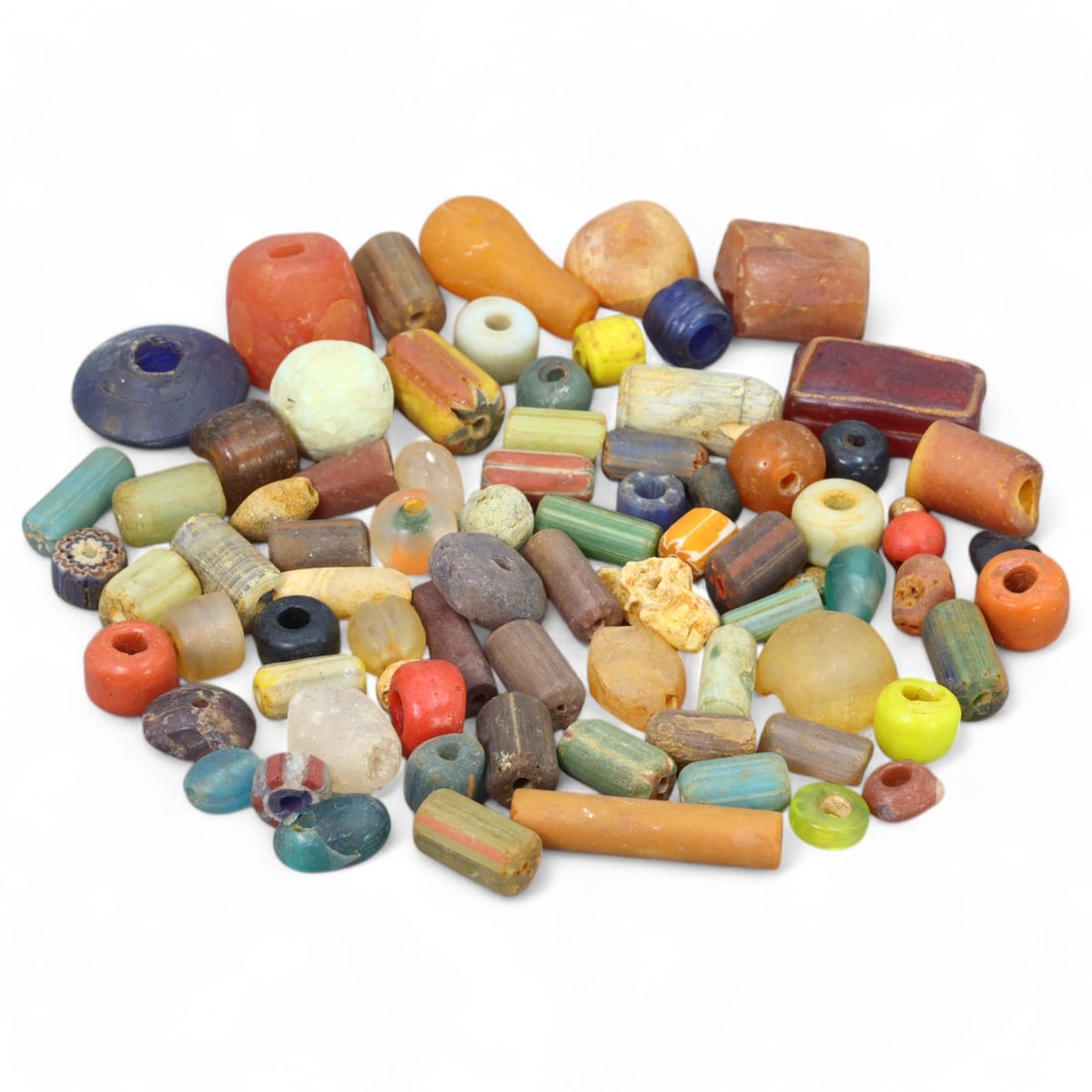 Ancient to Medieval: Mixed Glass Beads, European and Near Eastern (0.5-2 cm, 68g): This captivating lot of mixed glass beads highlights the artistic and cultural exchanges between Europe and the Near East. The beads, display a stunning array of colors and patterns, reflecting the ad
