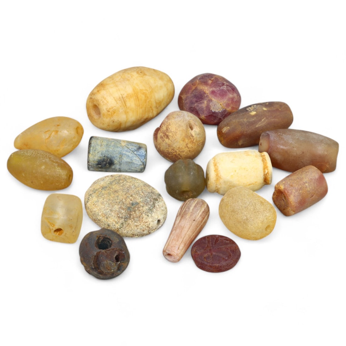 Silk Road Treasures: Stone Beads, Ancient Trade Artifacts (1-2 cm, 57g): This remarkable collection of stone beads reflects the vibrant trade and cultural exchanges along the historic Silk Road. Ranging from 1 to 2 cm, these beads showcase a variety of natural stones, each