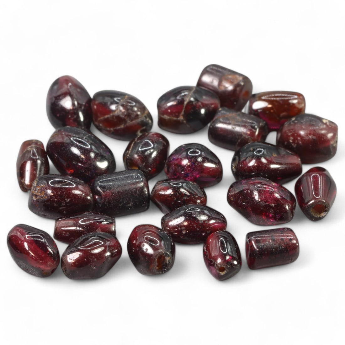 ANGLO-SAXON ERA: Red Garnet Bead Collection, Circa 6th-8th Century CE (Avg. 0.5 cm, 5.8g): This remarkable collection of Anglo-Saxon red garnet beads offers a glimpse into the artistry and craftsmanship of early medieval England. Each bead, averaging 0.5 cm in size, showcases the deep, rich