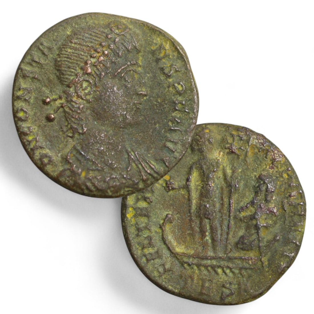 CONSTANTINOPOLIS COMMEMORATIVE AE FOLLIS: Bronze Coin, 2.2g, 16mm: This small bronze follis was struck as part of the commemorative series celebrating the founding of Constantinople. The obverse features a helmeted bust of Constantinopolis, the personification of the