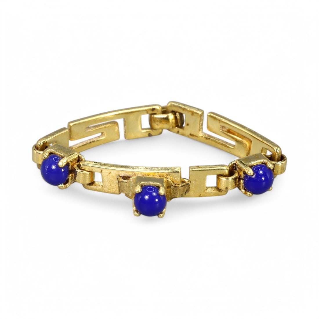 MODERN GOLD-GILT RING WITH BLUE ACCENTS: Contemporary Design (2g, Size 9 US): This elegant modern ring features a gold-gilt band with bold geometric elements, accented by striking blue orbs that add a touch of sophistication. The gold-gilt finish exudes luxury, while the vibran