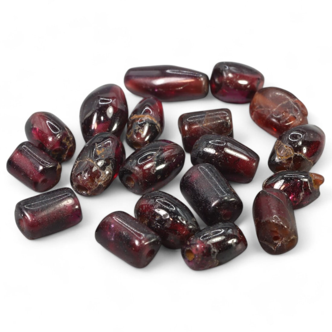 ANGLO-SAXON ERA: Red Garnet Bead Collection, Circa 6th-8th Century CE (Avg. 0.5 cm, 4.8g): This remarkable collection of Anglo-Saxon red garnet beads offers a glimpse into the artistry and craftsmanship of early medieval England. Each bead, averaging 0.5 cm in size, showcases the deep, rich