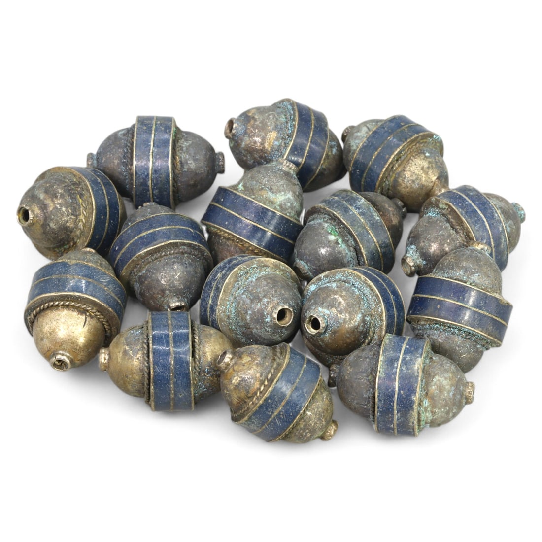 ISLAMIC ERA: Silver and Lapis Lazuli Beads, 12th-14th Century CE (74g Total, 2.5x1.5cm Each): This captivating set of Islamic-era beads features a harmonious combination of silver craftsmanship and vivid lapis lazuli inlays. Each bead, measuring 2.5x1.5 cm, is adorned with meticulously detaile