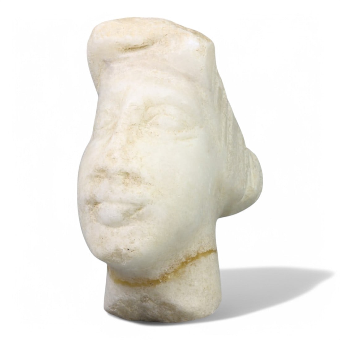 RENAISSANCE ERA: Marble Bust Carving, Circa 15th-16th Century CE (403g, 9x8cm): This finely carved Renaissance-era marble bust, weighing 403 grams and measuring 9x8 cm, embodies the period's artistic devotion to naturalism and human emotion. The soft contours of the face, subtle 