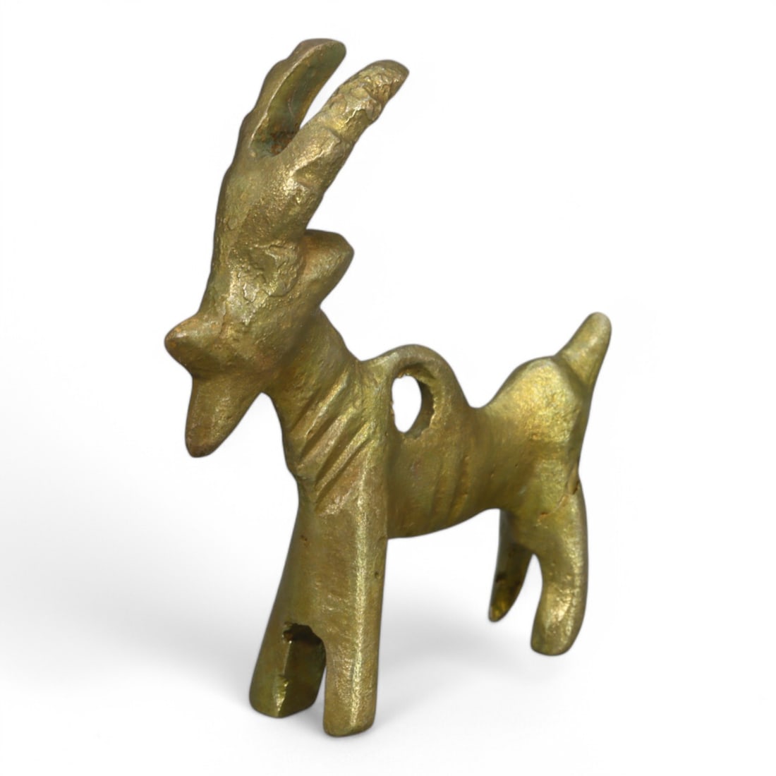 MONGOLIAN GOLD-GILT GAZELLE AMULET: Intricately Designed Pendant (20g, 4cm): This gold-gilt Mongolian amulet represents a gazelle, a symbol of agility, freedom, and resilience in regional culture. The amulet features a suspension hole, indicative of its use as a pendant or tal