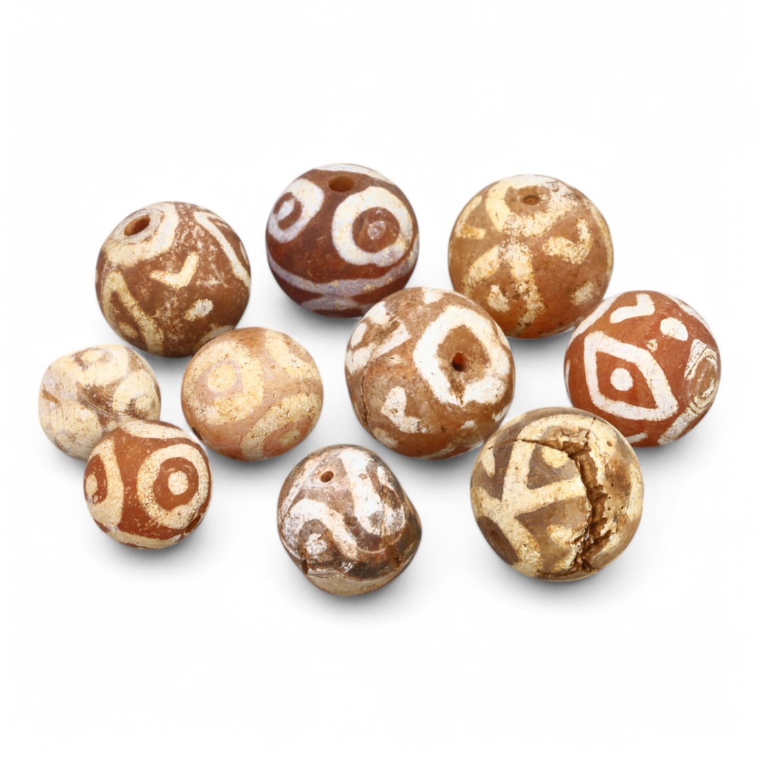 TIBETAN CULTURE: Antique Etched Carnelian Mala Beads (14g, 10-12mm): This set of antique Tibetan mala beads is crafted from etched carnelian, featuring intricate white zigzag and linear patterns that enhance their spiritual significance and aesthetic appeal. These bead