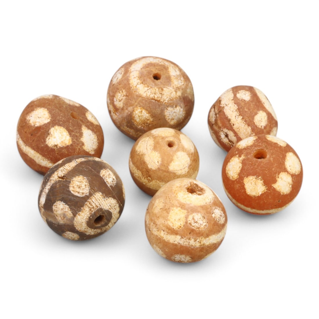 TIBETAN CULTURE: Antique Etched Carnelian Mala Beads (10g, 10-12mm): This set of antique Tibetan mala beads is crafted from etched carnelian, featuring intricate white zigzag and linear patterns that enhance their spiritual significance and aesthetic appeal. These bead