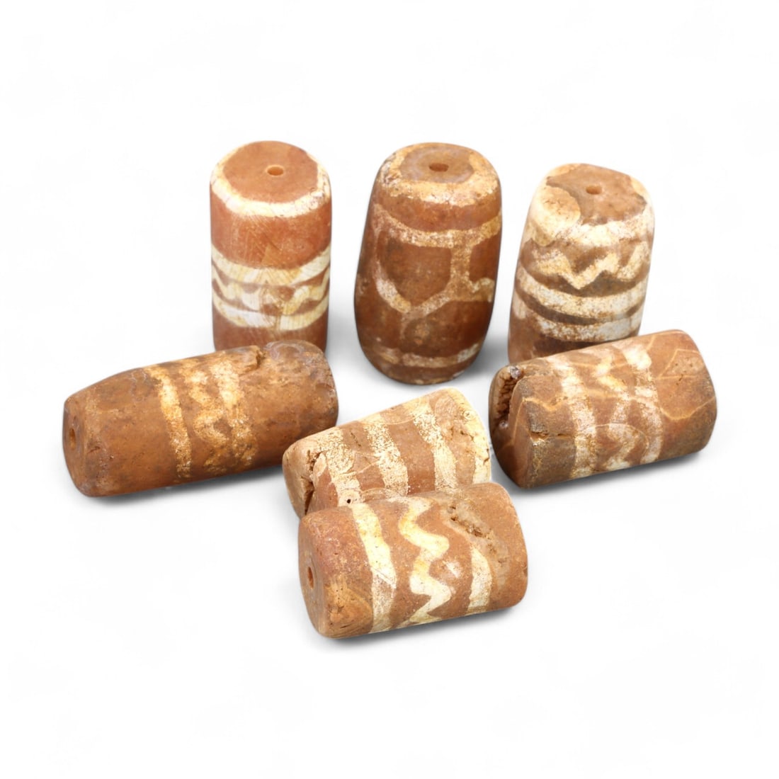 TIBETAN CULTURE: Antique Etched Carnelian Mala Beads (21g, 21g, 15-18mm): This set of antique Tibetan mala beads is crafted from etched carnelian, featuring intricate white zigzag and linear patterns that enhance their spiritual significance and aesthetic appeal. These bead