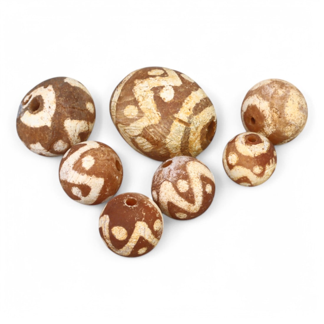 TIBETAN CULTURE: Antique Etched Carnelian Mala Beads (9g, 8-14mm): This set of antique Tibetan mala beads is crafted from etched carnelian, featuring intricate white zigzag and linear patterns that enhance their spiritual significance and aesthetic appeal. These bead