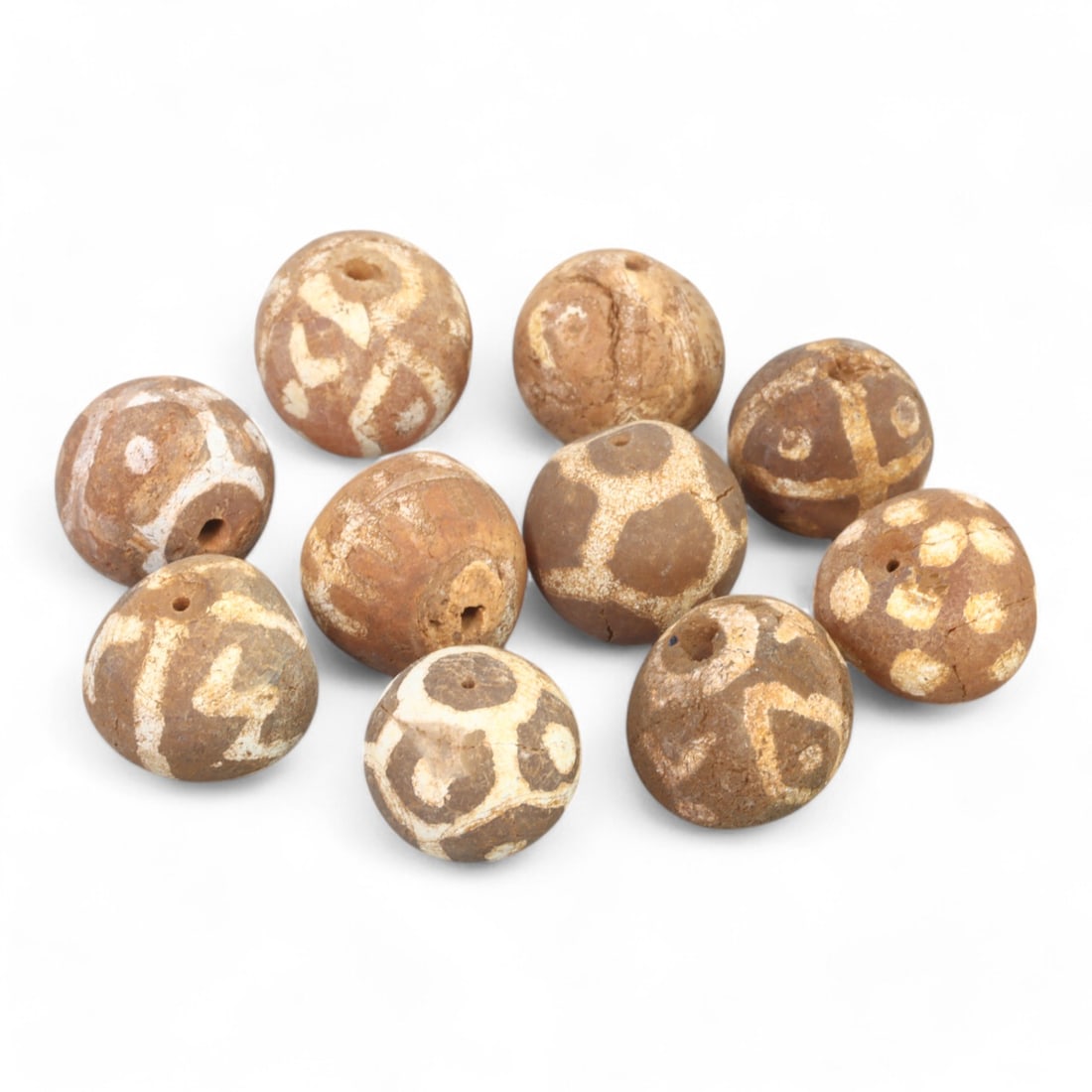 TIBETAN CULTURE: Antique Etched Carnelian Mala Beads (20g, 10-12mm): This set of antique Tibetan mala beads is crafted from etched carnelian, featuring intricate white zigzag and linear patterns that enhance their spiritual significance and aesthetic appeal. These bead